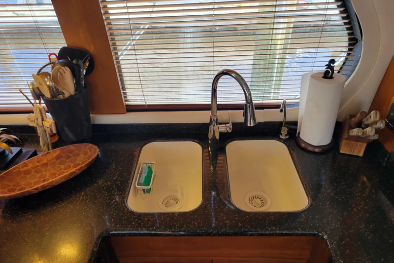  Yacht Photos Pics Kitchen sink area on a 2001 Carver 570 Voyager Pilothouse yacht.