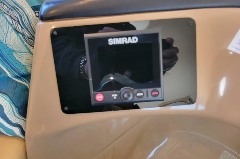  Yacht Photos Pics Simrad navigation system on 2001 Carver 570 Voyager Pilothouse dashboard.