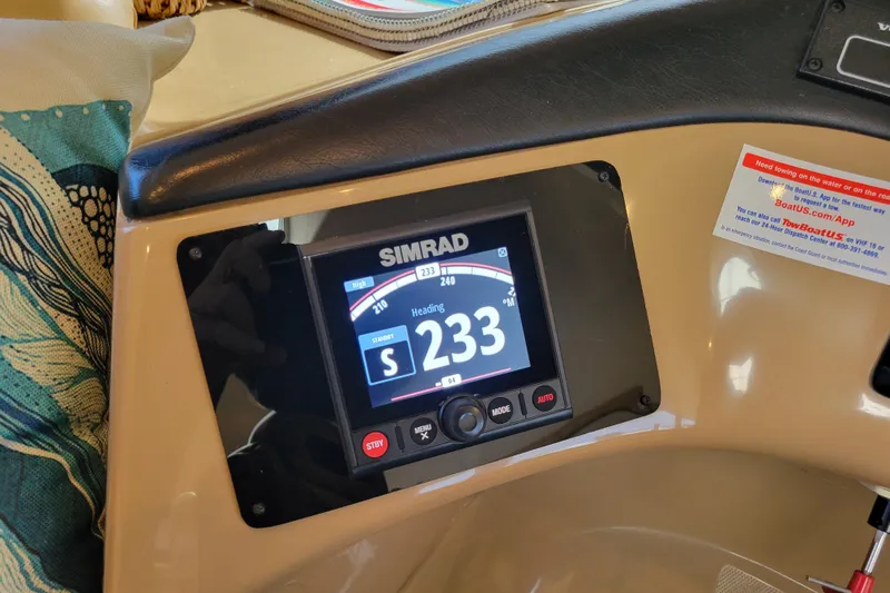  Yacht Photos Pics Simrad navigation display on 2001 Carver 570 Voyager Pilothouse showing heading 233 degrees.
