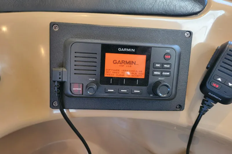  Yacht Photos Pics Garmin VHF 110 radio on 2001 Carver 570 Voyager Pilothouse dashboard.