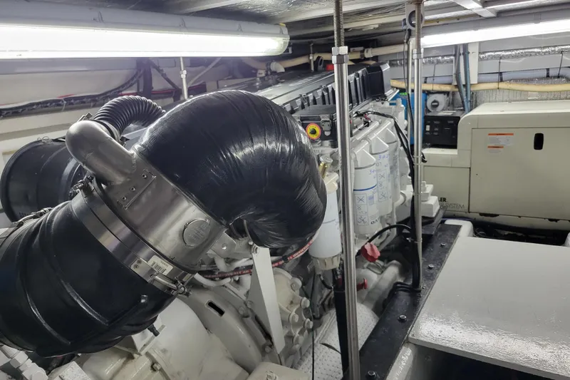  Yacht Photos Pics Engine room of 2001 Carver 570 Voyager Pilothouse with visible machinery and components.