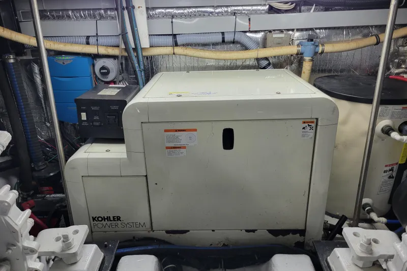  Yacht Photos Pics Engine room of 2001 Carver 570 Voyager Pilothouse with Kohler power system.