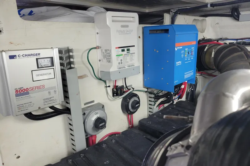  Yacht Photos Pics Electrical system components in a 2001 Carver 570 Voyager Pilothouse engine room.