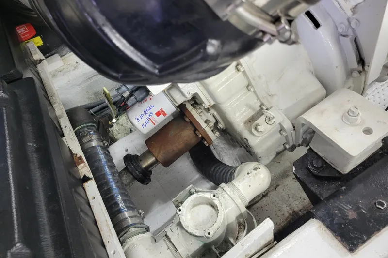  Yacht Photos Pics Engine compartment of a 2001 Carver 570 Voyager Pilothouse, showcasing mechanical components.