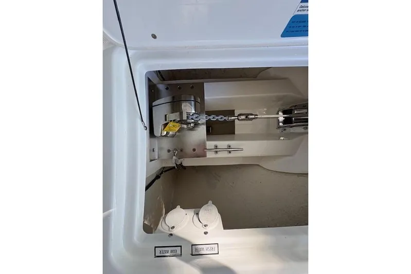  Yacht Photos Pics Anchor chain compartment of 2021 Pursuit OS 355 Offshore boat.
