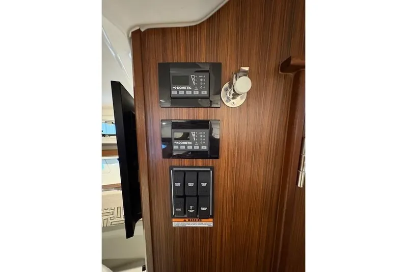  Yacht Photos Pics Control panel on 2021 Pursuit OS 355 Offshore boat with Dometic displays.