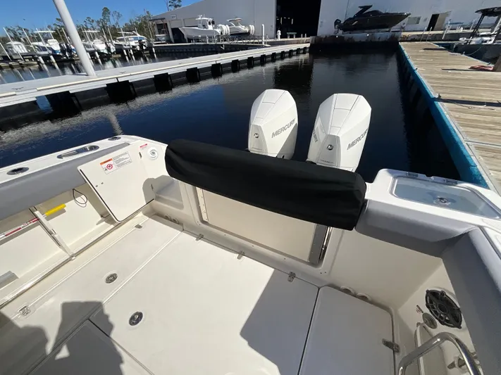  Yacht Photos Pics 2023 Boston Whaler 280 Outrage with dual Mercury engines docked at marina.