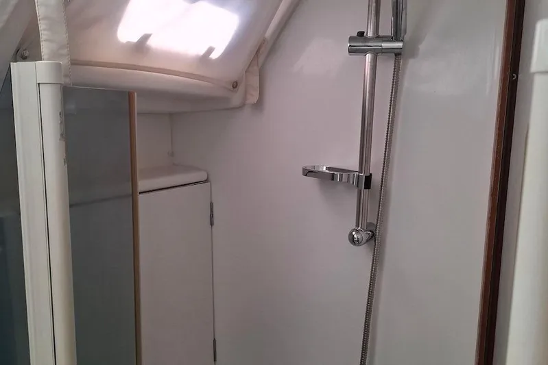  Yacht Photos Pics Shower area in 2009 Beneteau Oceanis 54 yacht, featuring sleek modern fixtures.