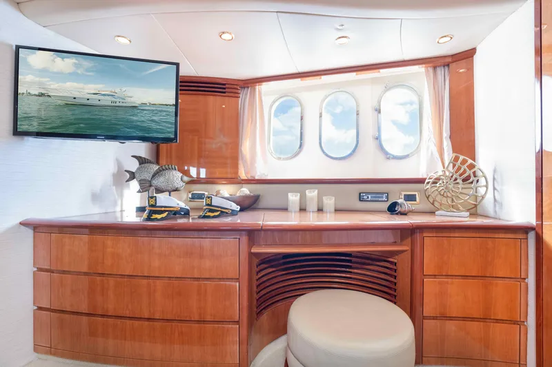  Yacht Photos Pics Luxurious interior of 2005 Azimut 62 Evolution yacht with elegant wood cabinetry and decor.