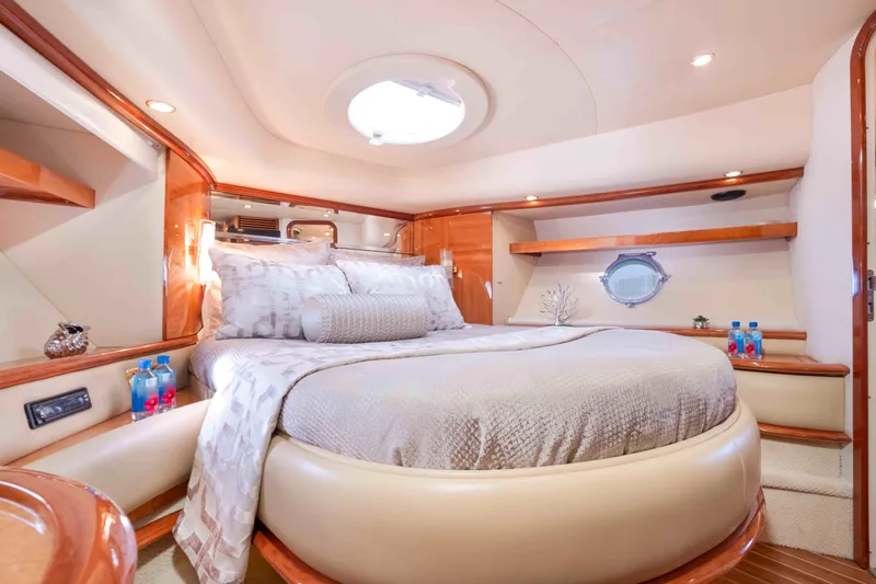  Yacht Photos Pics Luxurious bedroom interior of 2005 Azimut 62 Evolution yacht.