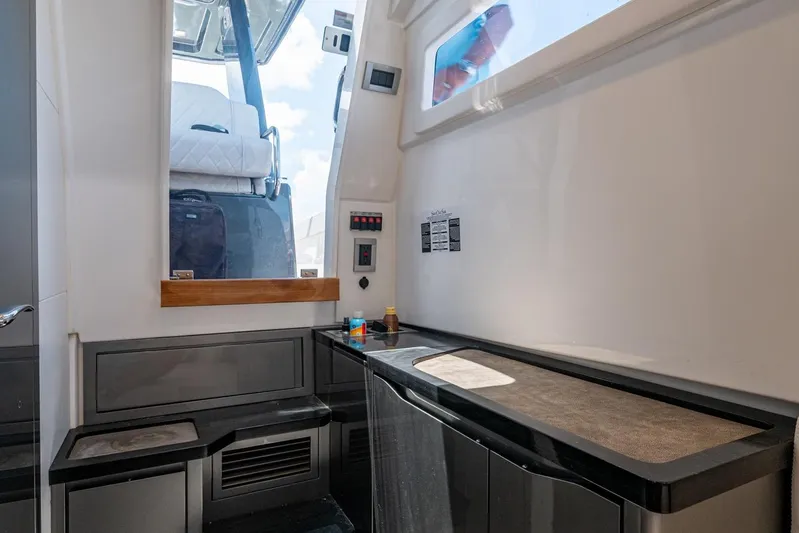 Drei Kinder Yacht Photos Pics 2023 Schaefer V33 yacht interior with modern design and sleek cabinetry.