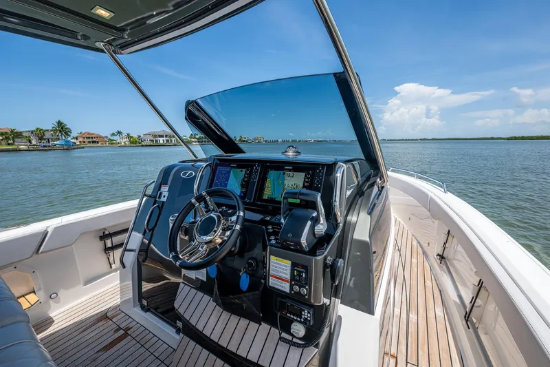 Drei Kinder Yacht Photos Pics 2023 Schaefer V33 yacht helm with advanced navigation system on a sunny day.