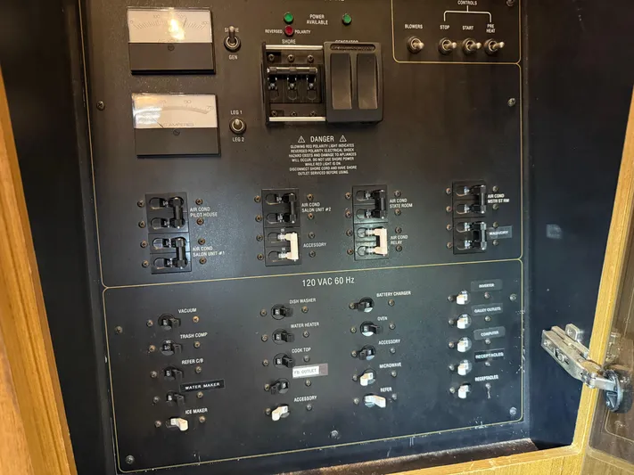 The Office Yacht Photos Pics Electrical panel of a 2001 Bayliner 5288 Pilot House Motoryacht, featuring various switches and controls.