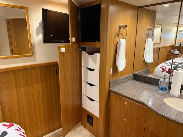 The Office Yacht Photos Pics Interior of 2001 Bayliner 5288 Pilot House Motoryacht with wood cabinetry and modern amenities.