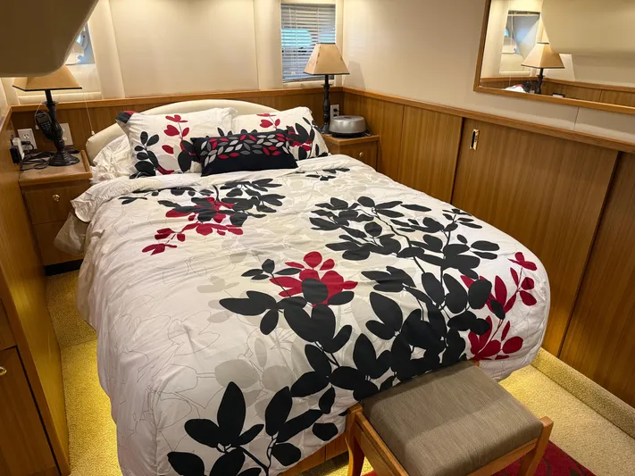 The Office Yacht Photos Pics Luxurious bedroom in 2001 Bayliner 5288 Pilot House Motoryacht with floral bedding.