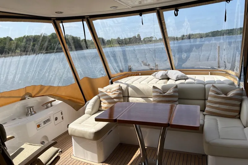  Yacht Photos Pics Luxurious interior of 2012 Sunseeker Manhattan 53 yacht with scenic water view.