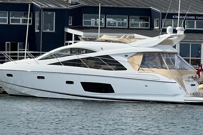  Yacht Photos Pics Luxury 2012 Sunseeker Manhattan 53 yacht docked at a marina.