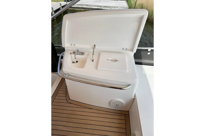  Yacht Photos Pics Sunseeker Manhattan 53 yacht sink area, 2012 model, with teak flooring and open lid.