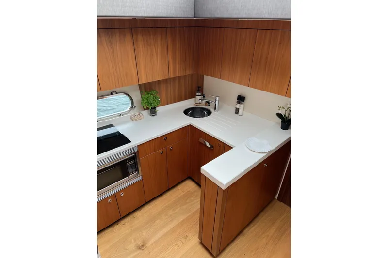  Yacht Photos Pics Luxurious kitchen interior of 2012 Sunseeker Manhattan 53 yacht with modern amenities.