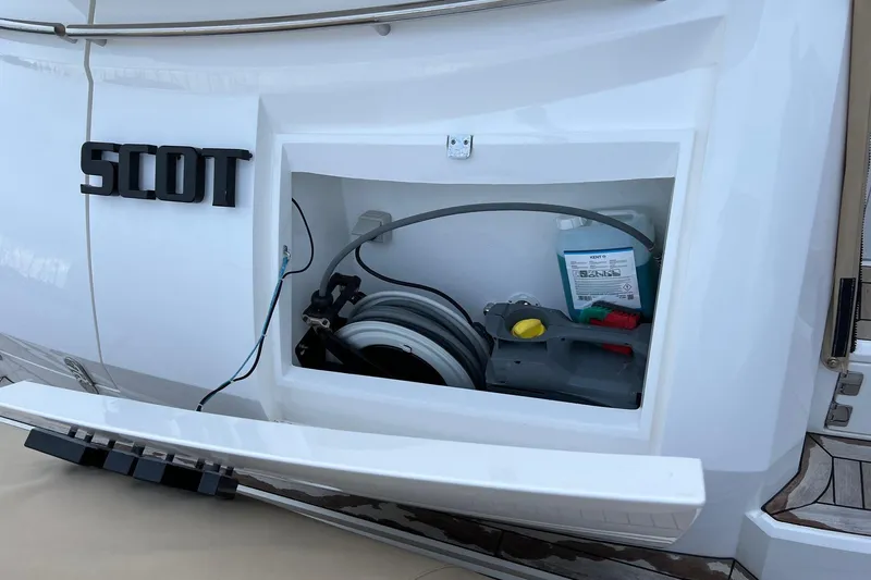  Yacht Photos Pics Storage compartment on a 2012 Sunseeker Manhattan 53 yacht, featuring equipment and supplies.