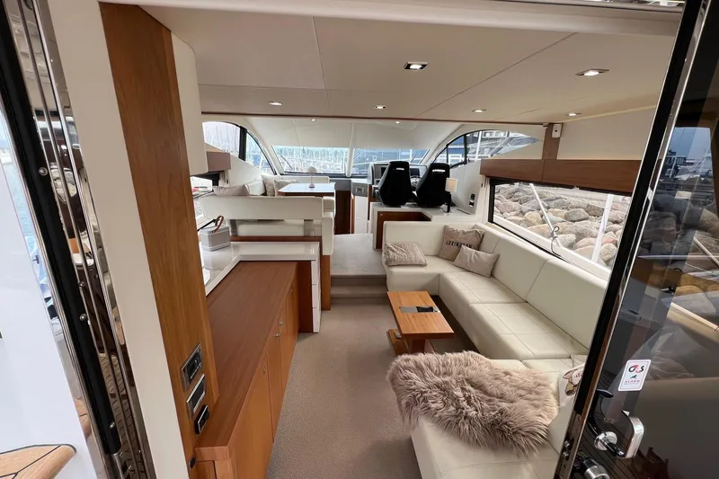  Yacht Photos Pics Luxurious interior of 2012 Sunseeker Manhattan 53 yacht with elegant seating and modern design.