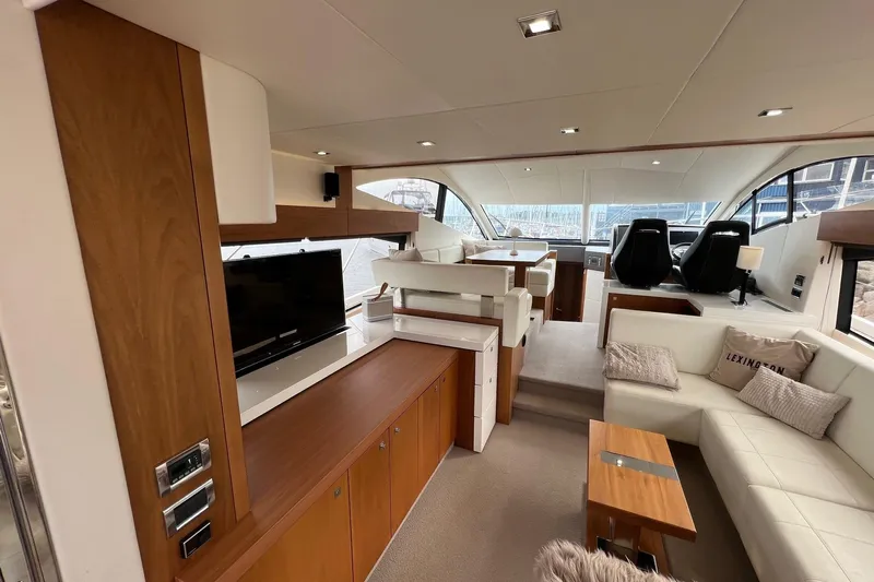  Yacht Photos Pics Luxurious interior of 2012 Sunseeker Manhattan 53 yacht with modern furnishings and elegant design.