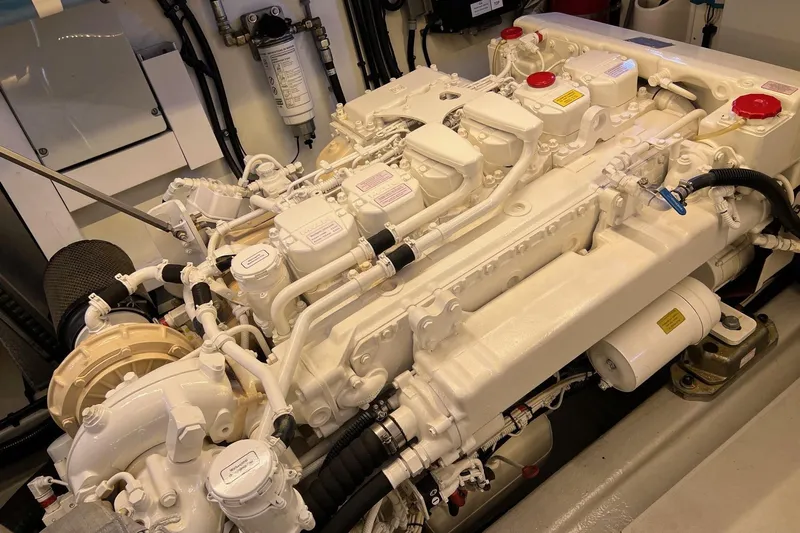  Yacht Photos Pics Engine room of 2012 Sunseeker Manhattan 53 yacht, showcasing detailed machinery components.