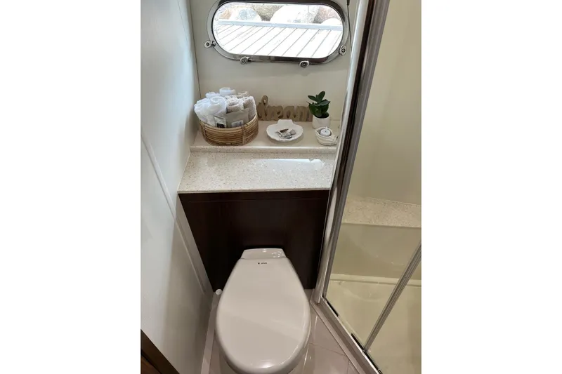  Yacht Photos Pics Luxurious bathroom in 2012 Sunseeker Manhattan 53 yacht with modern amenities.