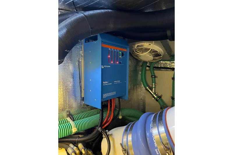  Yacht Photos Pics Engine room of 2012 Sunseeker Manhattan 53 yacht with electrical equipment and wiring.