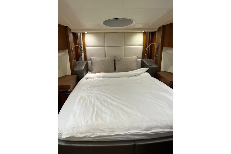  Yacht Photos Pics Luxurious bedroom interior of 2012 Sunseeker Manhattan 53 yacht with elegant bedding.