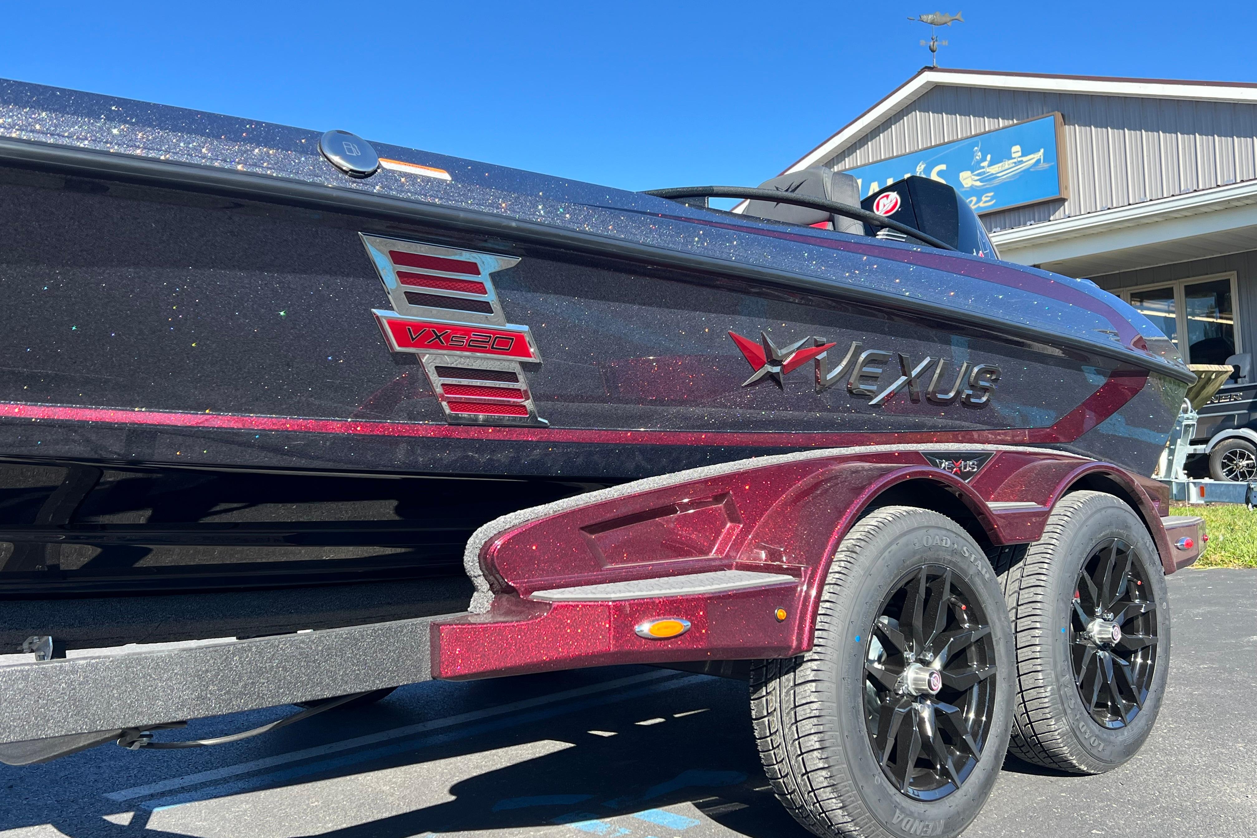 2026 Vexus VXS20 boat with sleek design and dual-axle trailer.