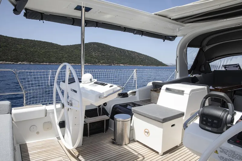  Yacht Photos Pics Luxurious 2020 Jeanneau 64 yacht cockpit with scenic ocean view.