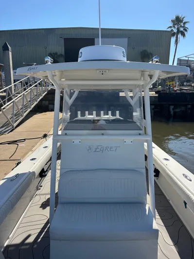  Yacht Photos Pics Egret 290 boat from 2019 at dock, front view.