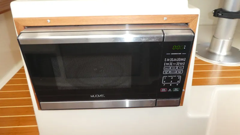 Second Act Yacht Photos Pics Built-in microwave in 2021 Ranger Tugs R-29 S boat kitchen area.