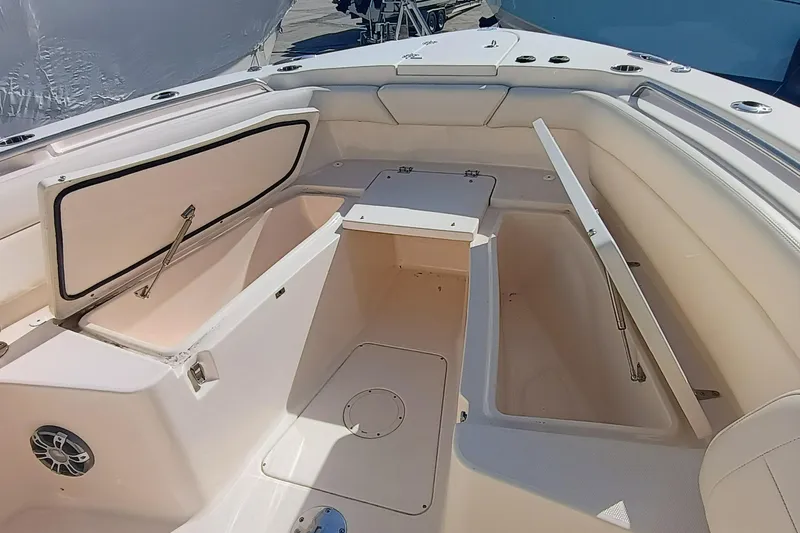 271-508 Brokerage Joe Yacht Photos Pics 2023 Grady-White Canyon 271 boat interior with open storage compartments.