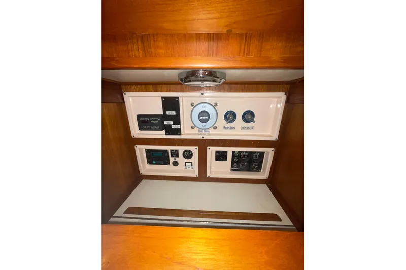 Skimmer Yacht Photos Pics Control panel of a 2000 Valiant 42 yacht with various switches and gauges.