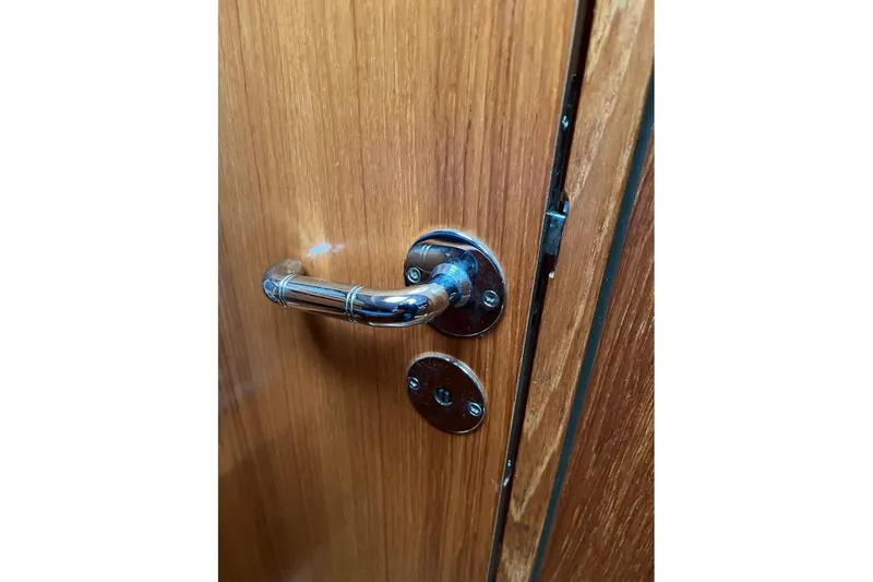 Arrow Yacht Photos Pics Chrome door handle on Jeanneau Sun Odyssey 45 yacht, 2008 model.