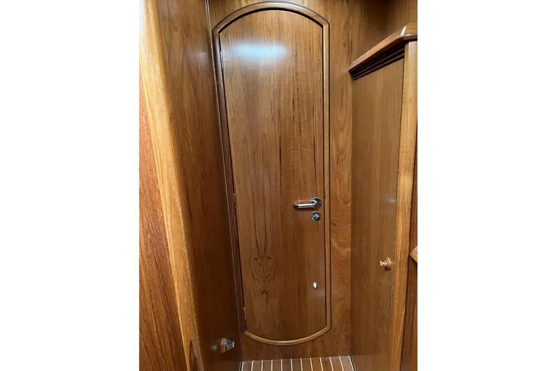Arrow Yacht Photos Pics Wooden interior door on 2008 Jeanneau Sun Odyssey 45 yacht.