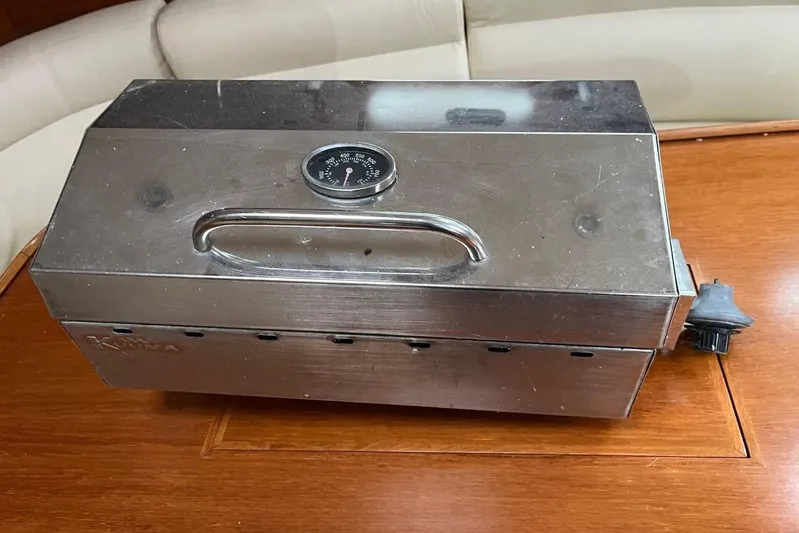 Arrow Yacht Photos Pics Stainless steel grill with thermometer on Jeanneau Sun Odyssey 45, 2008 model.