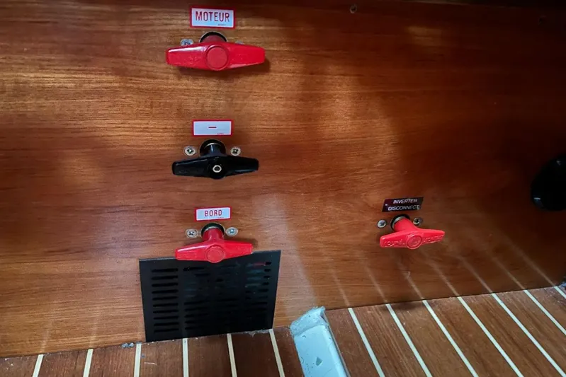 Arrow Yacht Photos Pics Control panel of a 2008 Jeanneau Sun Odyssey 45 sailboat with labeled switches.