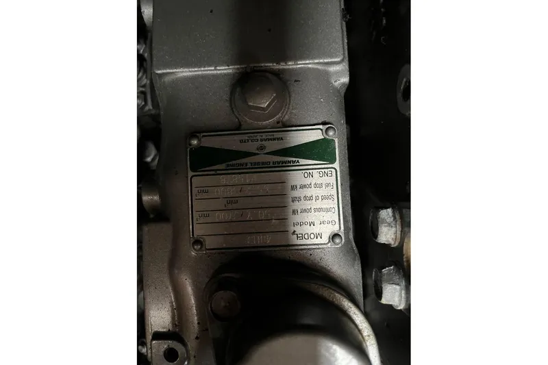 Arrow Yacht Photos Pics Engine plate of a 2008 Jeanneau Sun Odyssey 45 sailboat, displaying specifications.