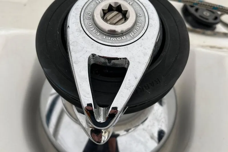 Arrow Yacht Photos Pics Winch handle on a 2008 Jeanneau Sun Odyssey 45 sailboat deck.