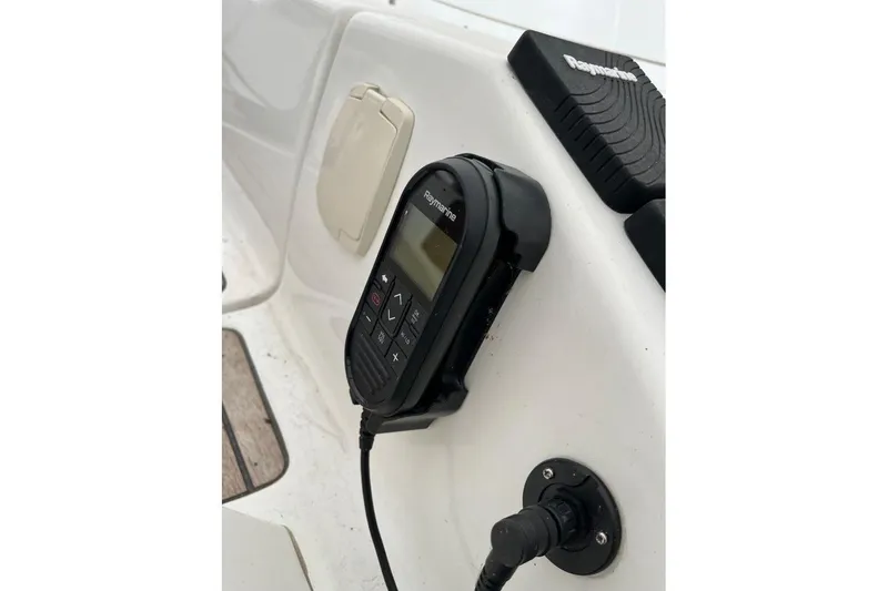 Arrow Yacht Photos Pics Raymarine control panel on 2008 Jeanneau Sun Odyssey 45 yacht, mounted on white surface.