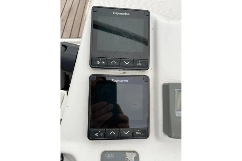 Arrow Yacht Photos Pics Raymarine navigation displays on 2008 Jeanneau Sun Odyssey 45 yacht dashboard.