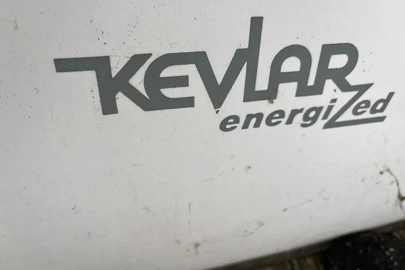 Arrow Yacht Photos Pics "Kevlar Energized" logo on Jeanneau Sun Odyssey 45, 2008 model.