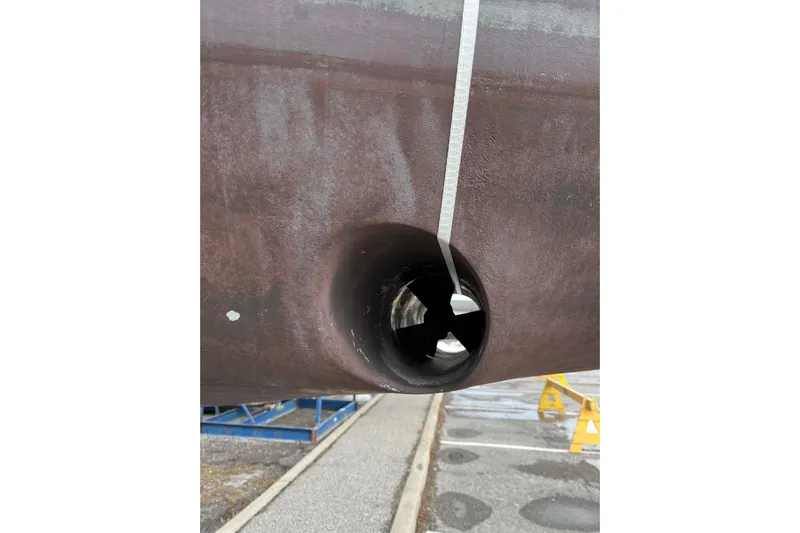 Arrow Yacht Photos Pics Close-up of Jeanneau Sun Odyssey 45 hull, 2008 model, showing bow thruster tunnel.