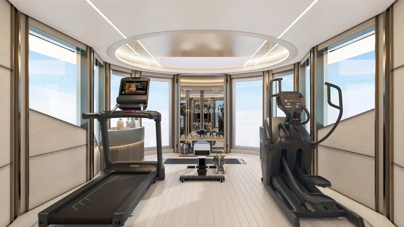  Yacht Photos Pics Luxurious gym on ISA Sportiva 66 yacht, featuring modern treadmill and elliptical, 2027 model.