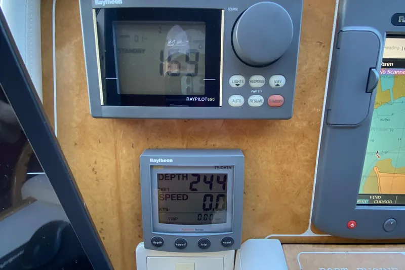 Grey Goose Yacht Photos Pics Boat navigation instruments displaying depth, speed, and course on a Compass 55, year 2000.