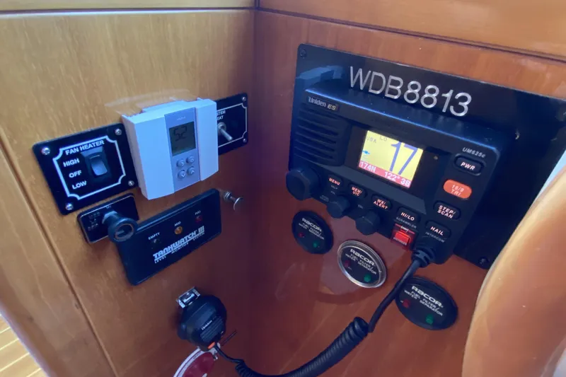 Grey Goose Yacht Photos Pics Control panel of a 2000 Compass 55 boat with radio and thermostat.