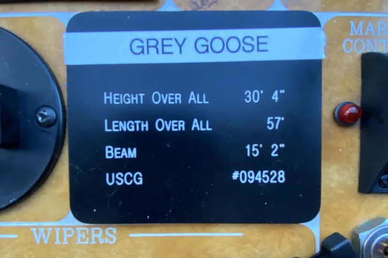 Grey Goose Yacht Photos Pics Control panel of a 2000 Compass 55 boat, labeled "Grey Goose," with dimensions and USCG number.